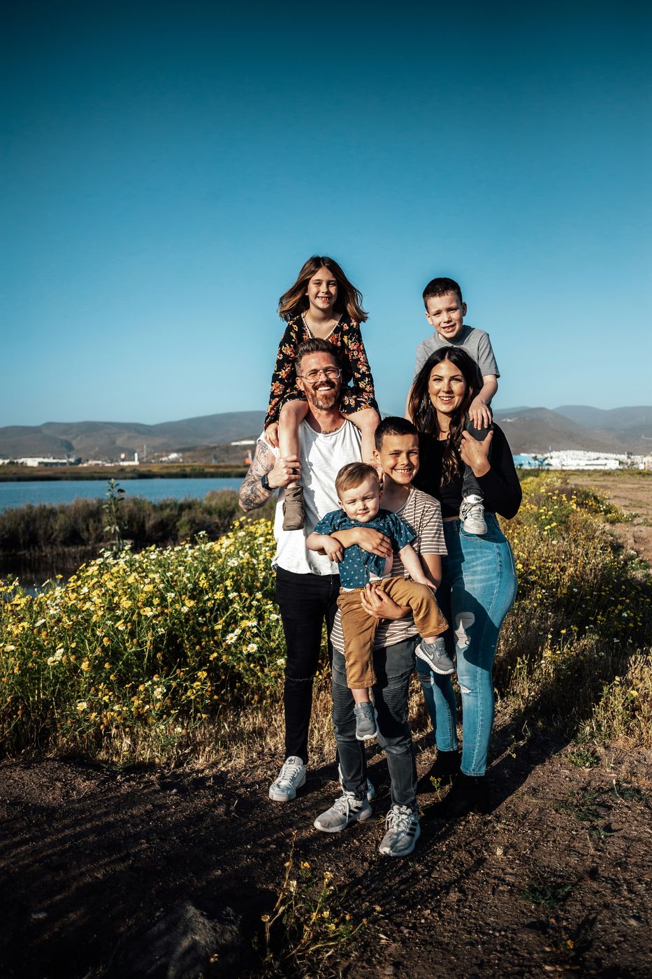 Family spending time together outdoors, representing personal and family insurance coverage